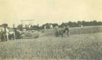 James Lowe and his binder machine, ca. 1908